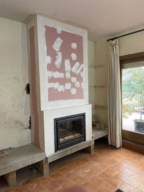 Proyecto de leña: cassette y pladur nuevo en una chimenea de ladrillo
